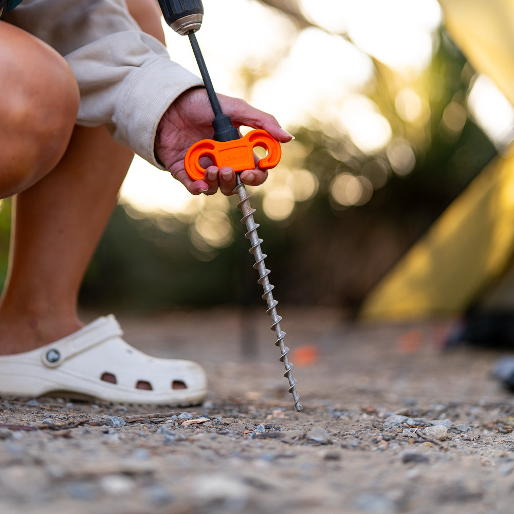 Drilling in peg into rocky campsite in the bush | Camping Accessories | Screw in Pegs | Camping Pegs | Peg for Hard Ground | Heavy Duty Peg | Tiegear Hard Terra