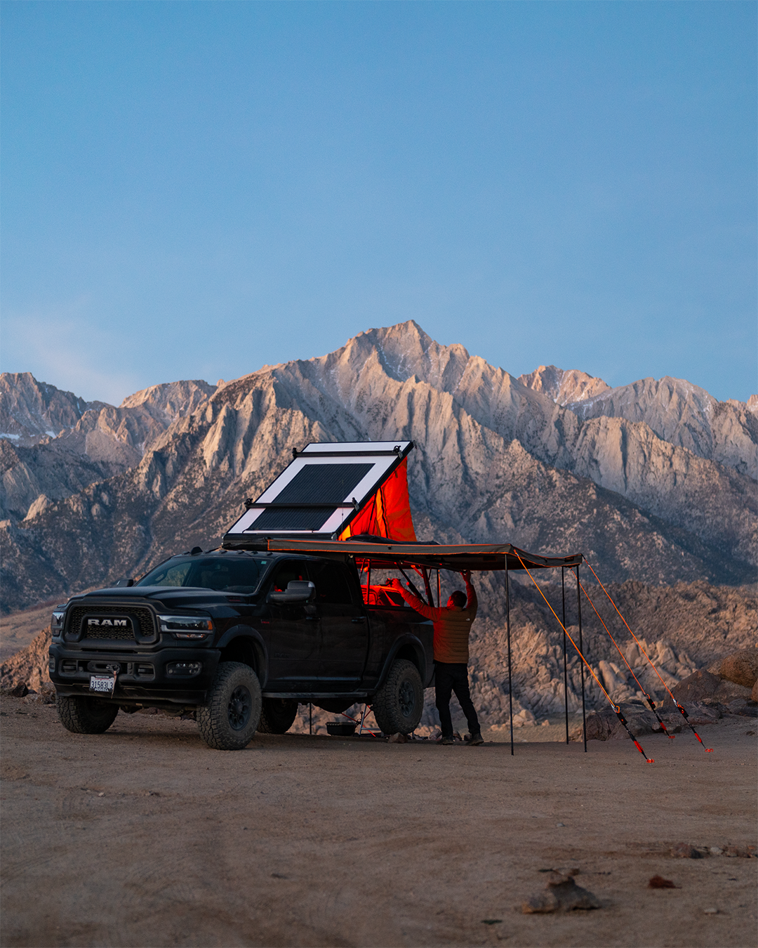 Getting gear out the truck bed while protected by the 270 awning anchored down with tie downs | 270 awning accessories | Camping Accessories | Camping | Tiegear Guy Rope